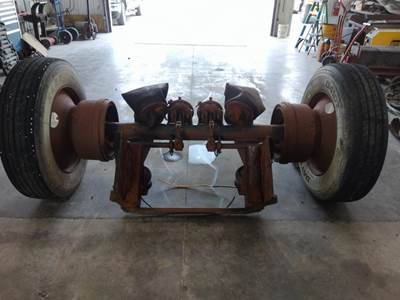 USED NON STEERABLE RIDEWELL TAG AXLE. 34 3/4" FRAME WIDTH. 