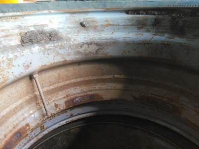 USED STEER TIRE AND WHEEL 