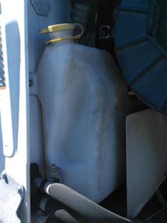 Mack Pinnacle CXU612 Right Windshield Washer Reservoir for a Mack CXU612