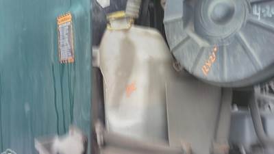 Mack Pinnacle CXU612 Right Windshield Washer Reservoir for a Mack CXU612