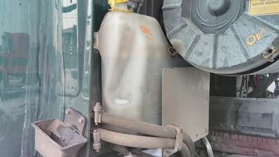 Mack Pinnacle CXU612 Right Windshield Washer Reservoir for a Mack CXU612