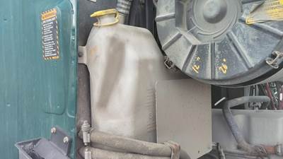 Mack Pinnacle CXU612 Right Windshield Washer Reservoir for a Mack CXU612