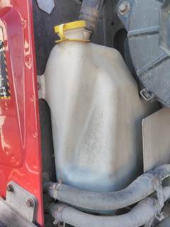 Mack Pinnacle CXU613 Right Windshield Washer Reservoir for a Mack CXU613