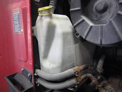 Mack Pinnacle CXU613 Right Windshield Washer Reservoir for a Mack CXU613