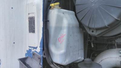 Mack Vision CX613 Right Windshield Washer Reservoir for a Mack CX613