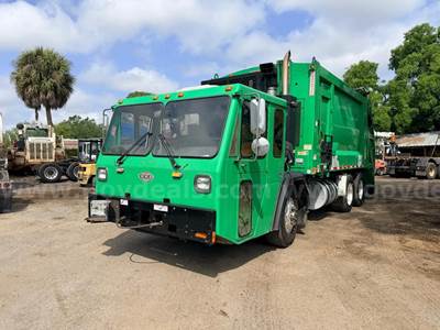 2015 Crane Carrier Co. Low Entry with Heil 25 Cu Yard Rear Load Garbage Truck