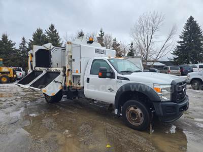 2015 Ford F-550 with HAUL ALL Garbage Collector