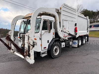 2018 Peterbilt 320 Front Load Trash Truck