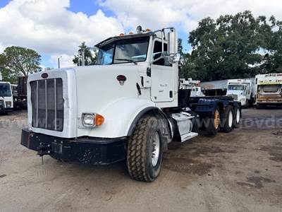 2014 Peterbilt 365 Tri/Axle Roll Off Truck