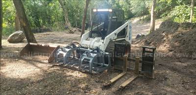 Bobcat skid steer with attachments