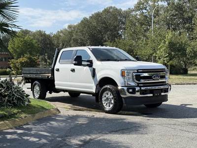 Ford F-350 SD XLT 4X4 Crew Cab 8-Foot Flat Deck Truck