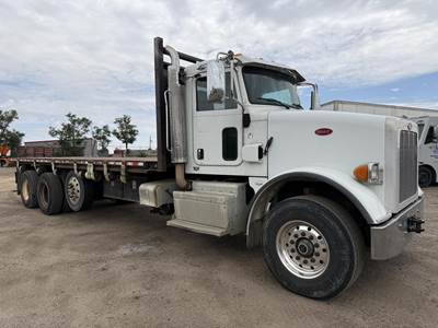 Peterbilt 365 Tri Axle 24.5 ft Flatbed Truck - 425HP, 10 Speed Manual
