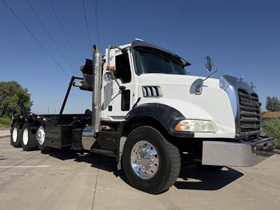 Mack Granite GU813 Tri Axle Roll Off Truck - MP7, 410HP, 6 Speed Allison Rds Automatic