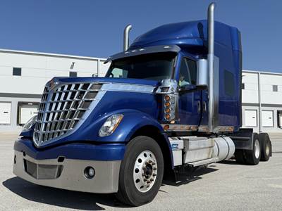 International LoneStar Sleeper Semi Truck - 73" Mid Roof Sleeper, Cummins 500HP, 13 Speed Manual