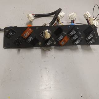 Good used switch panel for a International FE bus, includes door switch.  1999