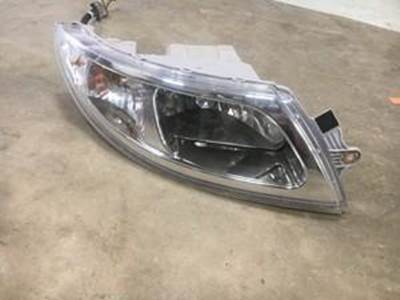 Good used passenger side headlight for International truck, or bus.    OEM#
