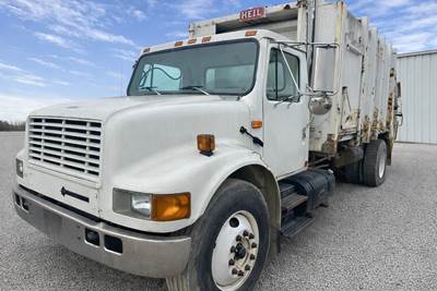International 4900 Side Load Garbage Truck
