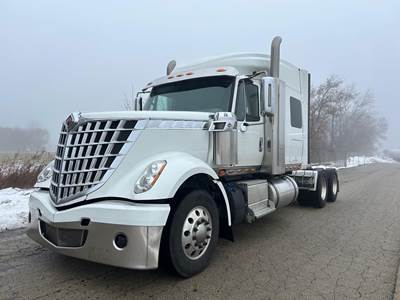 International LoneStar Sleeper Semi Truck - 72" Mid Roof Sleeper, Cummins 550HP, Manual