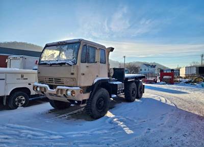 1997 Stewart & Stevenson M1090 Flatbed Dump Truck