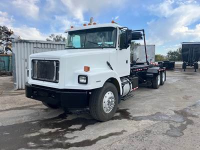 1998 Volvo WG Roll Off Truck