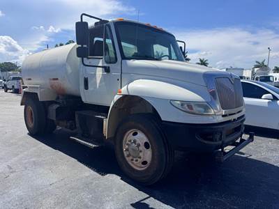 2017 INTERNATIONAL 4300 SBA WITH 2,000 GALLONS WATER TANK, FRONT, REAR, AND SIDE SPRAYER, CUMMINS POWER, LOW MILES
