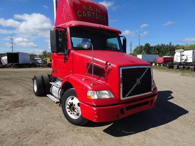 Volvo VNM42T200 Single Axle Day Cab Truck - VED12 325HP, 10 Speed Manual