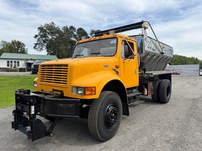 1997 International 4900 Flatbed Dump Truck - Swenson Salter - Has some rust. Manual Transmission.