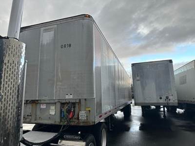 Fruehauf 48 ft Dry Van Trailer - Roll up Door, Spring, Sliding Axle