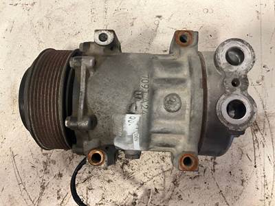 USED AIR CONDITIONER COMPRESSOR. 

