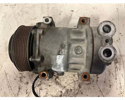 USED AIR CONDITIONER COMPRESSOR. 

