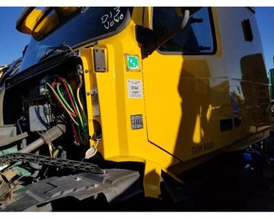 Used 2011 Volvo VNL Left Cab Trim Between Hood and Front Door