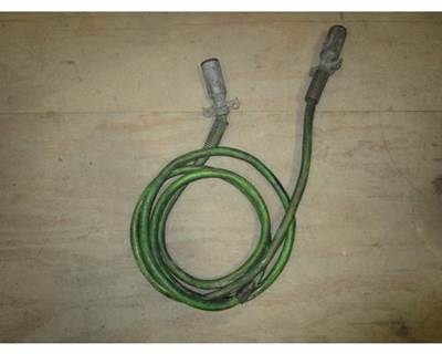 USED GREEN ABS TRAILER CABLE. ELECTRICAL TAPE ON SMALL SECTION