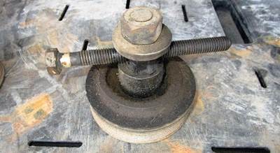 USED CUMMINS N14 WATER PUMP TENSIONER PULLEY. 6 GROOVE 