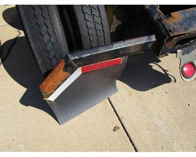 Used 2005 Freightliner Columbia 120 Left Rear Mudflap Bracket with Mudflap, Black, 45 Degree
