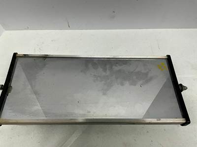 Used Mack Mirror with Mack emblem with a chrome finish
