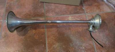 USED AIR HORN. 24 1/4 INCHES LONG