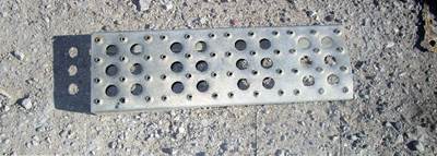 USED ALUMINUM STEP. 
APPROX: 16 INCHES LONG BY 5 INCHES WIDE