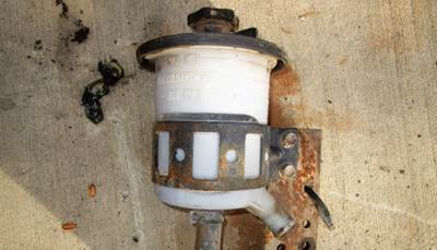 USED POWER STEERING FLUID RESERVOIR