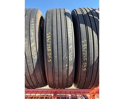 USED FIRESTONE FS591 285/75R24.5 STEER TIRE.  TREAD DEPTH 12/32nds