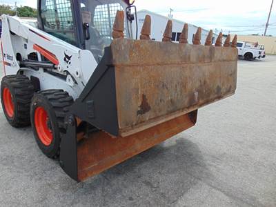 Caterpillar 4-IN-1 COMBO BUCKET Skid Steer Attachment