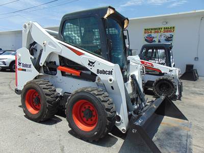 2019 BOBCAT S650 TURBO 2 SPEED - BOB TACH - STEREO - HEAT AND A/C - NEW TIRES - ONLY 1,797 HOURS - 100% JOB READY