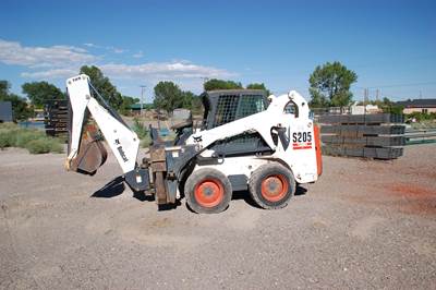 2005 Ingersoll-Rand Track Skid Steer - Ingersoll-Rand Bobcat 709 Backhoe