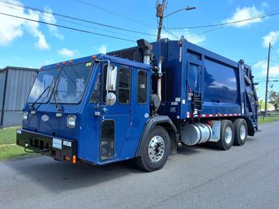 Crane Carrier (CCC) LET2 Tandem Axle Side Load Garbage Truck - Cummins, 6 Speed Allison Rds Automatic