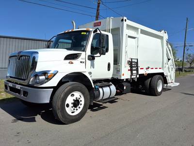 International HV Single Axle Side Load Garbage Truck - Cummins, 5 Speed Allison Rds Automatic
