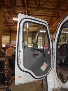 Freightliner M2 106 Left Door for a 2011 Freightliner M2106
