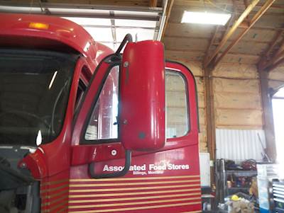 Freightliner Columbia 120 Left Mirror for a 2005 Freightliner Columbia CL120